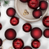 Burgundy Essential Glass Ornaments (24 Pack) featuring handcrafted glass in rich burgundy shades
